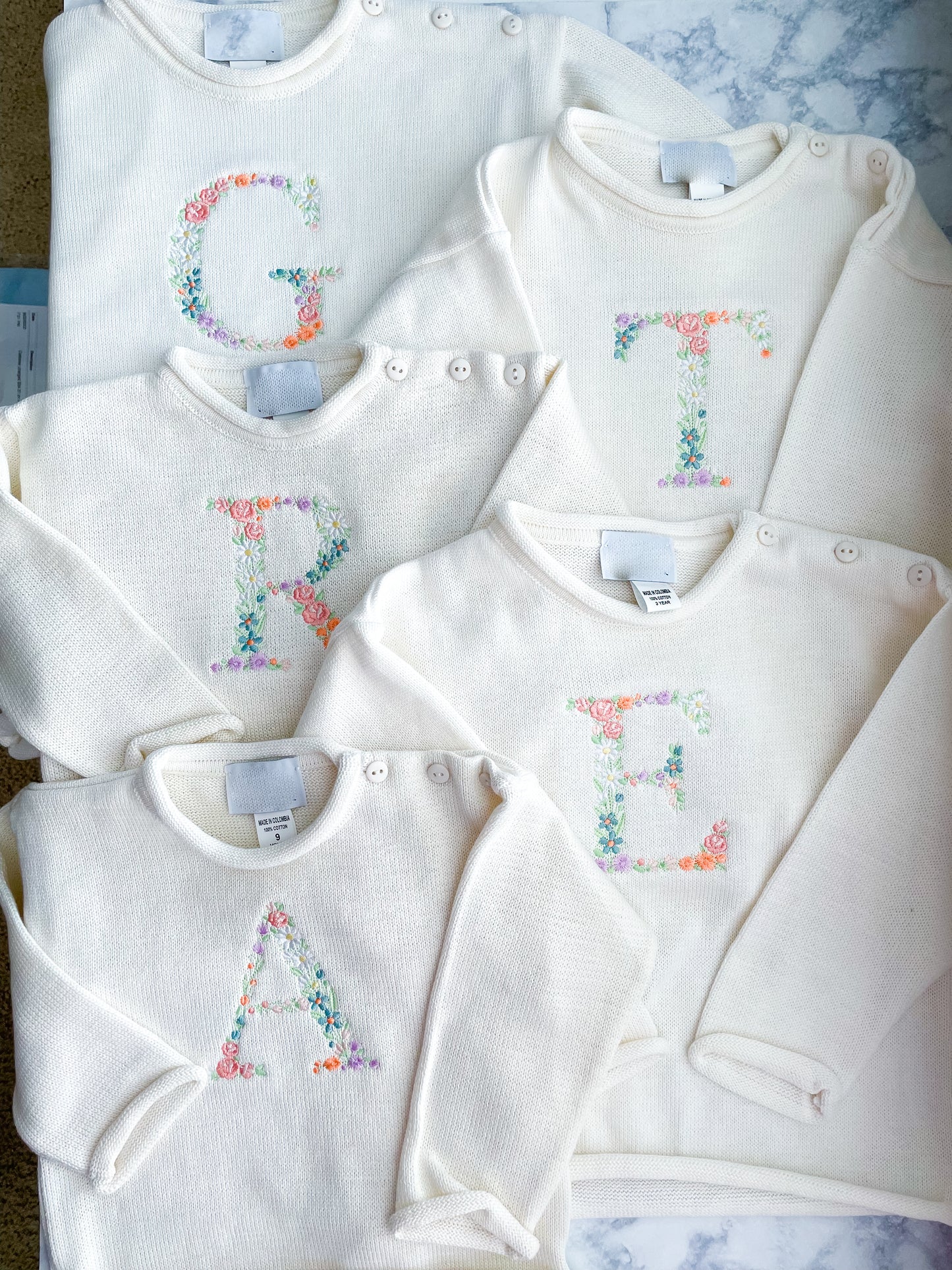 Floral Initial Rollneck Button Neck Sweater